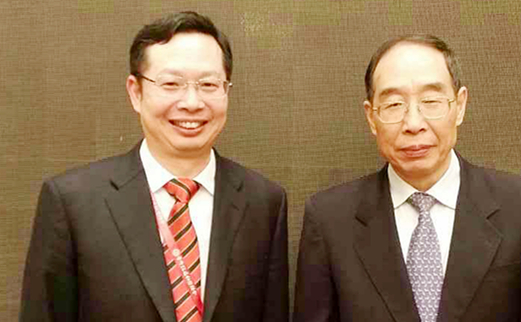 2014年5月福建省委书记尤权与华厦眼科医院集团董事长苏庆灿亲切合影